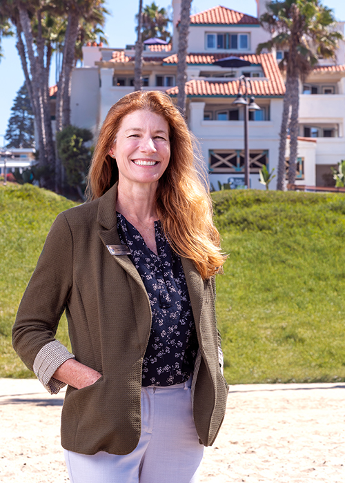 General Manager Shannon headshot in front of San Clemente Cove